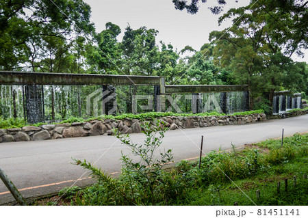 NEW TAIPEI CITY, TAIWAN - JANUARY 27, 2012:  Waterfall fence at Guan Dao Guan Ying Temple 81451141