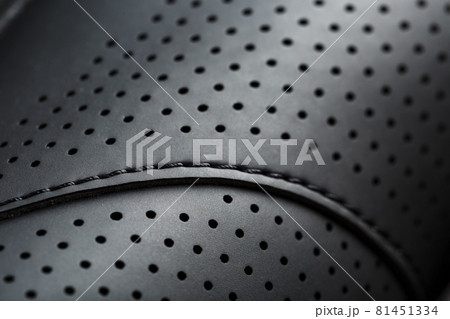 Perforated material made of black imitation leather in full screen 81451334