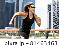 Athletic Asian Woman Running  81463463