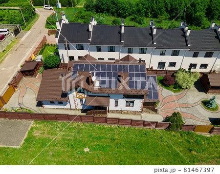 aerial view of house building with solar sun panels 81467397