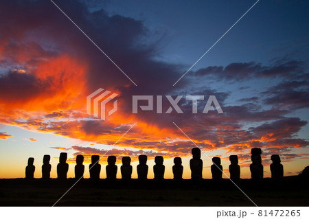 Dramatic colorful sunrise over Moai stone sculptures at Ahu Tongariki, Easter island, Chile. 81472265