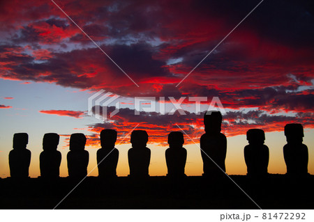 Dramatic colorful sunrise over Moai stone sculptures at Ahu Tongariki, Easter island, Chile. 81472292