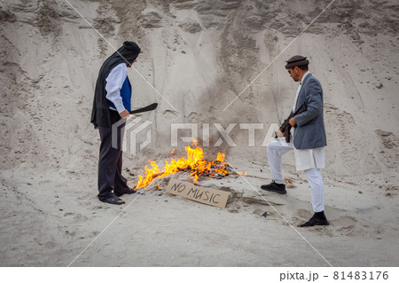 Afghan terrorists destroy music with fire. Afghan terrorists destroy music with fire. 81483176