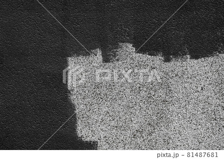 Black dark paint brush strokes on building facade, gray abstract pattern wall surface texture exterior background Black dark paint brush strokes on building facade, gray abstract pattern wall surface texture exterior background 81487681