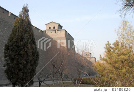 Pingyao in Shanxi Province, China. Pingyao city wall and watchtowers seen from the park next to the old wall. Pingyao in Shanxi Province, China. Pingyao city wall and watchtowers seen from the park next to the old wall. 81489826