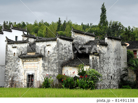 Sixi Yancun in Wuyuan County, Jiangxi Province, China. Sixi Yancun is an ancient town in Wuyuan County which is known for its Tang Dynasty architecture. Traditional village buildings with fields. 81491138