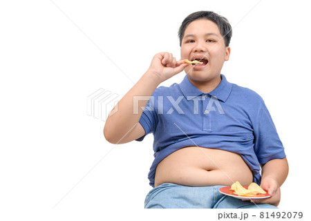 Obese fat boy eating potato chips isolated on white background, Obese fat boy eating potato chips isolated on white background, 81492079