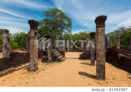 Stainding Buddha statue in ancient ruins 81492887