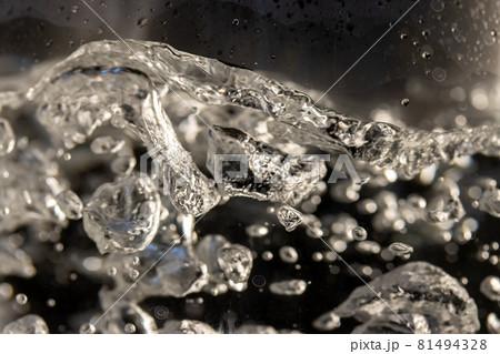 A water is boiled in an electric kettle with transparent walls, close up. 81494328
