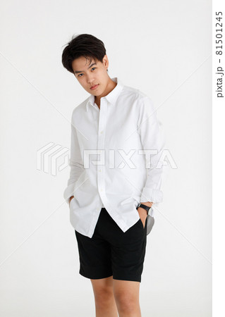 Half length shot portrait of a handsome good looking tomboy, a girl who loves to be a man, on white background Half length shot portrait of a handsome good looking tomboy, a girl who loves to be a man, on white background 81501245