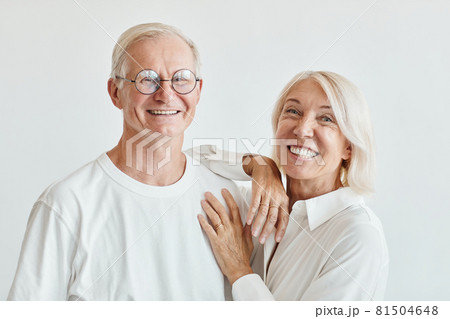 Smiling Senior Couple on White 81504648