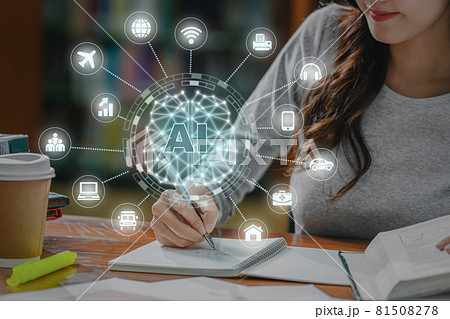 Polygonal brain shape of an artificial intelligence with various icon of smart city Internet of Things Technology over Asian young Student hand writing homework in library of university or colleage 81508278
