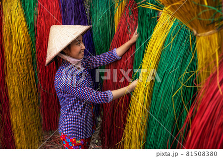 Vietnamese female craftsman drying traditional vietnam mats in the old traditional village at dinh yen, dong thap, vietnam, tradition artist concept Vietnamese female craftsman drying traditional vietnam mats in the old traditional village at dinh yen, dong thap, vietnam, tradition artist concept 81508380