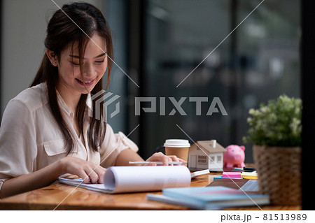 Portrait asian businesswoman or lawyer accountant working financial investment on office, using calculator analysis finance document report real estate and home loan insurance Portrait asian businesswoman or lawyer accountant working financial investment on office, using calculator analysis finance document report real estate and home loan insurance 81513989