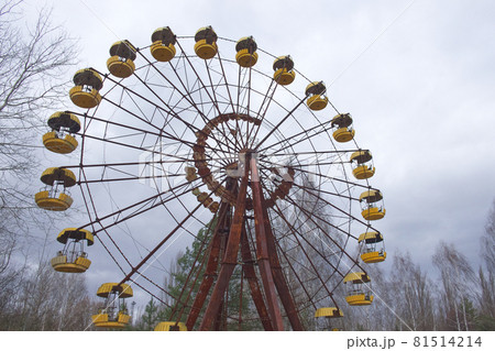 The famous Ferris wheel in an abandoned amusement park in Pripyat. Cloudy weather in the Chernobyl exclusion zone. The famous Ferris wheel in an abandoned amusement park in Pripyat. Cloudy weather in the Chernobyl exclusion zone. 81514214