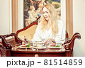 Beautiful young adult blond woman, On the table Beautiful young adult blond woman, On the table 81514859