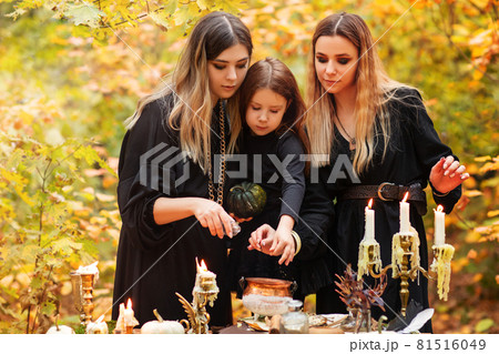 Witches preparing witch potion on Halloween day 81516049