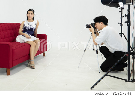 Asian man photographer and model woman taking pictures With dslr camera. led light proper of flash and accessories. Concept photography take picture by camera. Asian man photographer and model woman taking pictures With dslr camera. led light proper of flash and accessories. Concept photography take picture by camera. 81517543