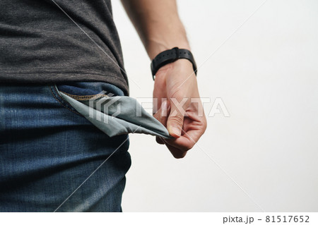 Man turning out the jean pocket to showing empty pocket. bankrupt, bad economy, no money concept. Man turning out the jean pocket to showing empty pocket. bankrupt, bad economy, no money concept. 81517652
