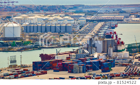 Barcelona, Spain - April 8, 2019: Industrial Port for freight transport and global business. Barcelona, Spain - April 8, 2019: Industrial Port for freight transport and global business. 81524522