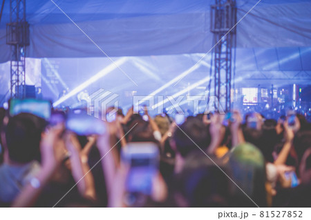 nightlife and youth activity with backside of crowd in concert hall during show hand ,take photo and see their favorite artist nightlife and youth activity with backside of crowd in concert hall during show hand ,take photo and see their favorite artist 81527852