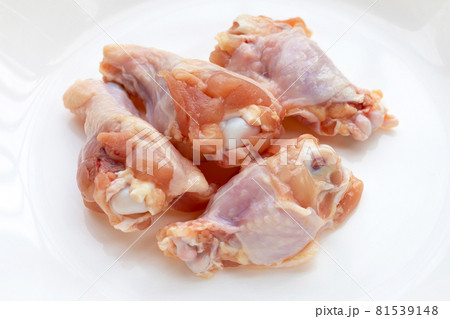 Fresh raw chicken wings (wingstick) in white bowl 81539148