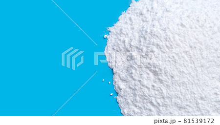 Baking soda on blue background. Baking soda on blue background. 81539172