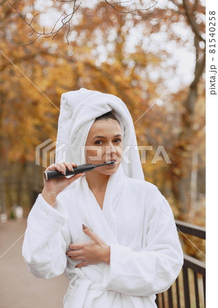Picture of beautiful woman in white bathrobe Picture of beautiful woman in white bathrobe 81540258