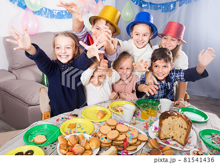 satisfied kids having a good time at a birthday party satisfied kids having a good time at a birthday party 81541436