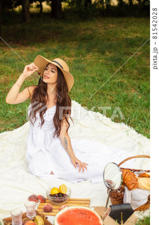 Beautiful Caucasian woman at picnic. Full length 81542028