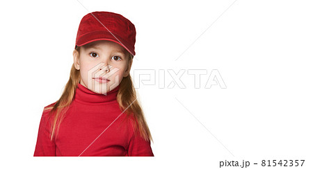 Girl wearing a red baseball cap isolated on white background Girl wearing a red baseball cap isolated on white background 81542357