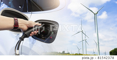 Double exposure of Hand man holding electric car charging in power station. Double exposure of Hand man holding electric car charging in power station. 81542378