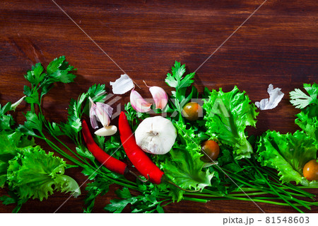 Fresh vegetables on wooden surface Fresh vegetables on wooden surface 81548603