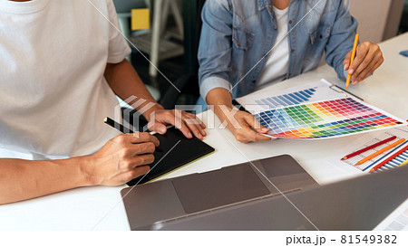 both coworkers designing some products choosing the appropriate shade 81549382