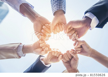 Diverse multiethnic Partners hands together teamwork group of multi racial people meeting join hands togetherness. Diversity people hands join empower partnership teams connection volunteer community 81550626