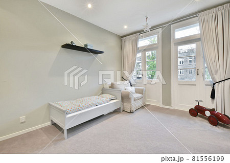 Interior of a cozy and bright bedroom with beautiful decoration 81556199