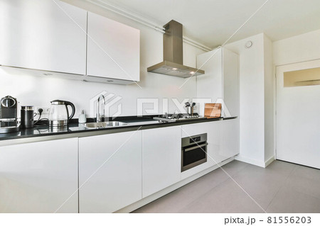 Beautiful and spacious kitchen in an elegant home 81556203