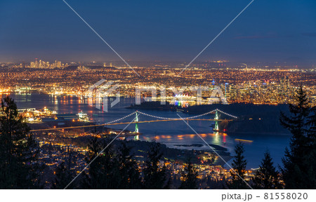 Vancouver city downtown panorama in night. Vancouver Harbour marina aerial view. Lions Gate Bridge, British Columbia, Canada. Vancouver city downtown panorama in night. Vancouver Harbour marina aerial view. Lions Gate Bridge, British Columbia, Canada. 81558020