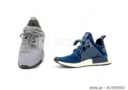 Gray and blue colors fashion sport shoes isolated on white background. 81566562