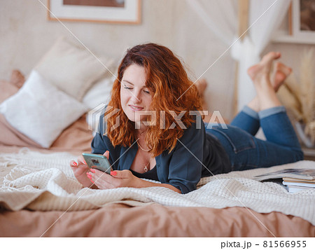 young woman enjoys the morning silence in her room young woman enjoys the morning silence in her room 81566955