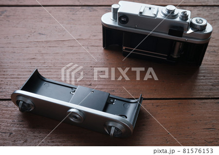 Old vintage 35 mm metal film camera, close-up Old vintage 35 mm metal film camera, close-up 81576153
