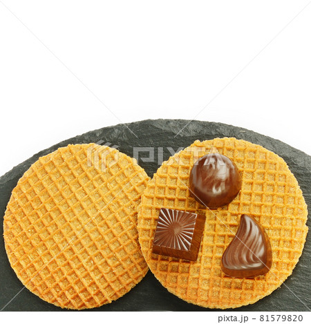 Belgian waffles and chocolate pralines isolated on white . Top view. Flat lay. 81579820