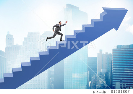 Businessman climbing career ladder in business concept Businessman climbing career ladder in business concept 81581807