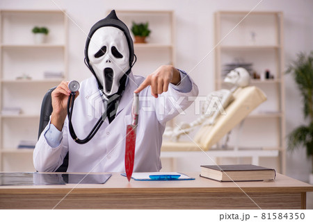 Devil doctor working in the clinic 81584350