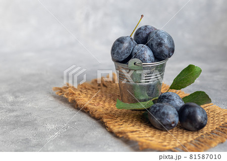 Plums on a light background. Harvesting the autumn harvest. Making jam and sauce. Still life. 81587010