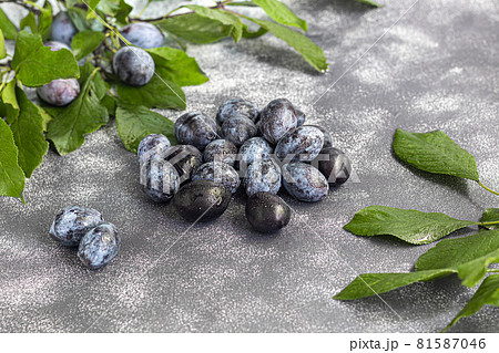 Plums on a light background. Harvesting the autumn harvest. Making jam and sauce. Still life. Plums on a light background. Harvesting the autumn harvest. Making jam and sauce. Still life. 81587046