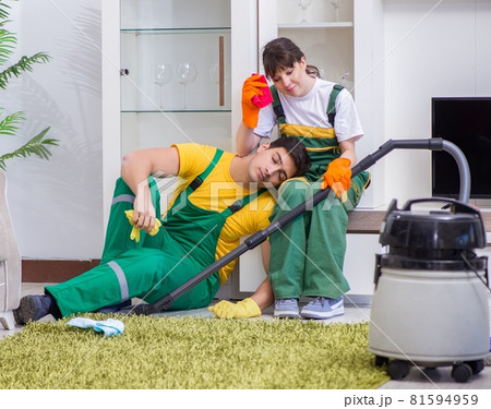 Cleaning professional contractors working at house Cleaning professional contractors working at house 81594959