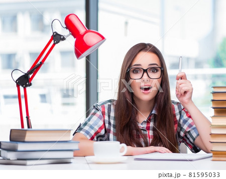 Young woman student preparing for college exams Young woman student preparing for college exams 81595033