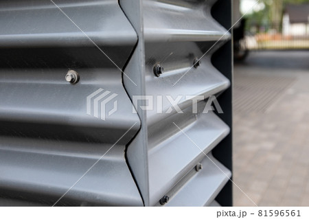 Gray steel building facade. Urban environment, technical and architectural solutions Gray steel building facade. Urban environment, technical and architectural solutions 81596561