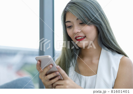 Fashionist woman using smart phone. 81601401